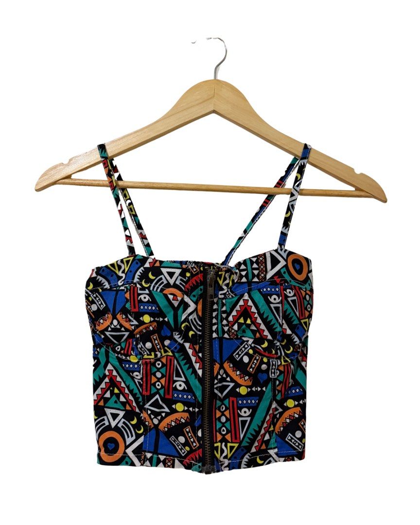 Geometric Print Zipper Front Crop Top (Category: Others Tops) located in Subic. Submitted by ciesells (Listing ID 1463152953, Image 1). Description: Bust: 22(XXS-XS) Length: 15 inches - Padded - Front zipper closure - Garterized back detail.