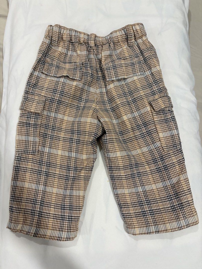 GingerSnaps Plaid Cargo Baby Pants 6M (Category: Babies & Kids Fashion) located in Pasig City. Submitted by fashionforward16 (Listing ID 1463221390, Image 3). Description: - Brand: GingerSnaps - Style: Plaid Cargo Shorts - Size: 6 Months (68-74cm) and up, depending on your baby’s height (see cm). - Features: Elastic waistband with button closure - Pockets: Two side cargo pockets, two back pockets - Occasion: Great for everyday wear.