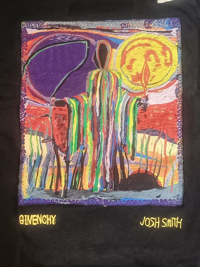 Givenchy x Josh Smith Graphic T-Shirt Black (Category: Tshirts & Polo Shirts ) located in Calamba. Submitted by sulitshopaholic (Listing ID 1463173378, Image 2). Description: - Black Givenchy T-Shirt - Features a colorful, abstract graphic print by artist Josh Smith - "GIVENCHY" and "JOSH SMITH" text printed below the graphic - Authentic Givenchy logo on inner tag - Ideal for collectors and fans of unique streetwear - Dimes: 27L X 22W.