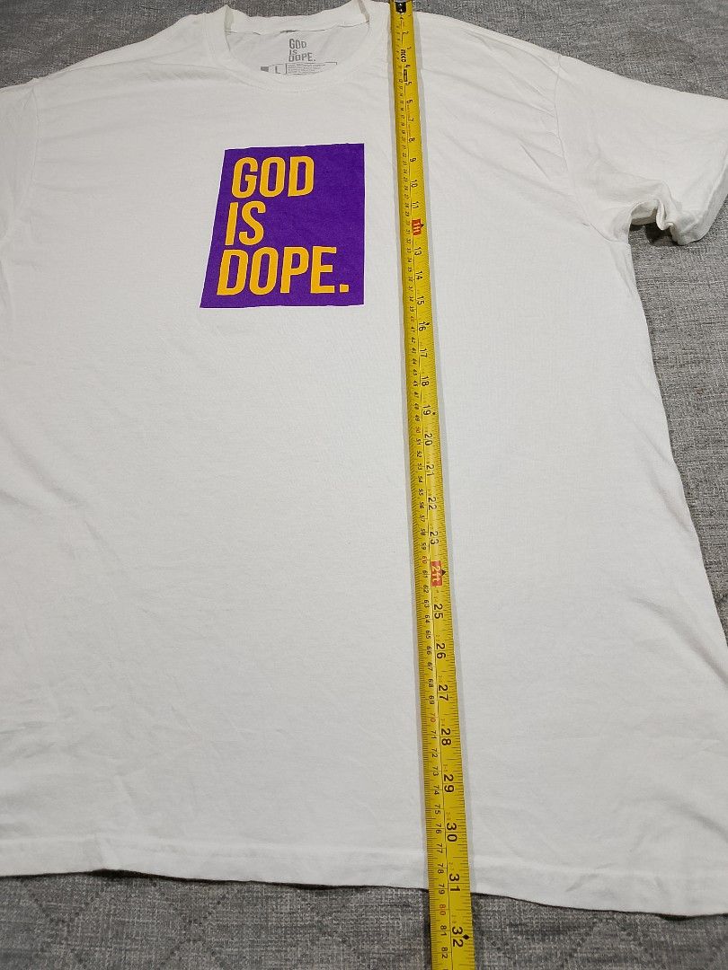 GOD IS DOPE white graphic T-shirt (Category: Tshirts & Polo Shirts ) located in Cadiz. Submitted by comradstuff (Listing ID 1463126872, Image 3). Description: GOD IS DOPE white graphic T-shirt w 22" l 31".