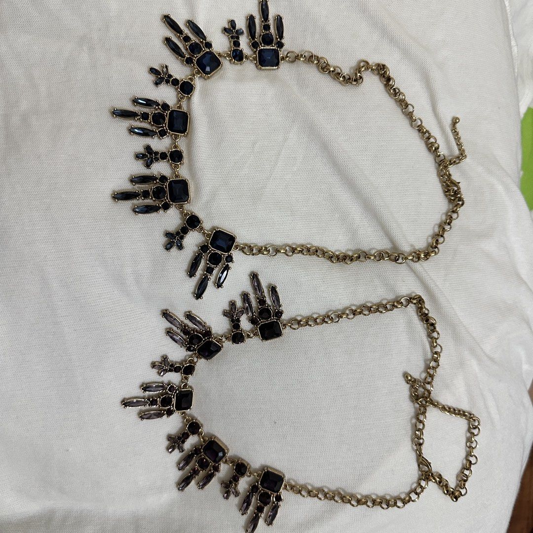 Gold Tone Statement Necklace Bundle (Category: Necklaces) located in Bulacan. Submitted by enne_123 (Listing ID 1463238740, Image 3). Description: - Gold-tone necklace with a striking statement pendant. - Features dazzling square and baguette-cut gems in rich blue and purple. - Classic link chain design. - Adds a vibrant pop of color and sparkle to any ensemble. - Versatile piece, ideal for elevating casual outfits or complementing evening wear..