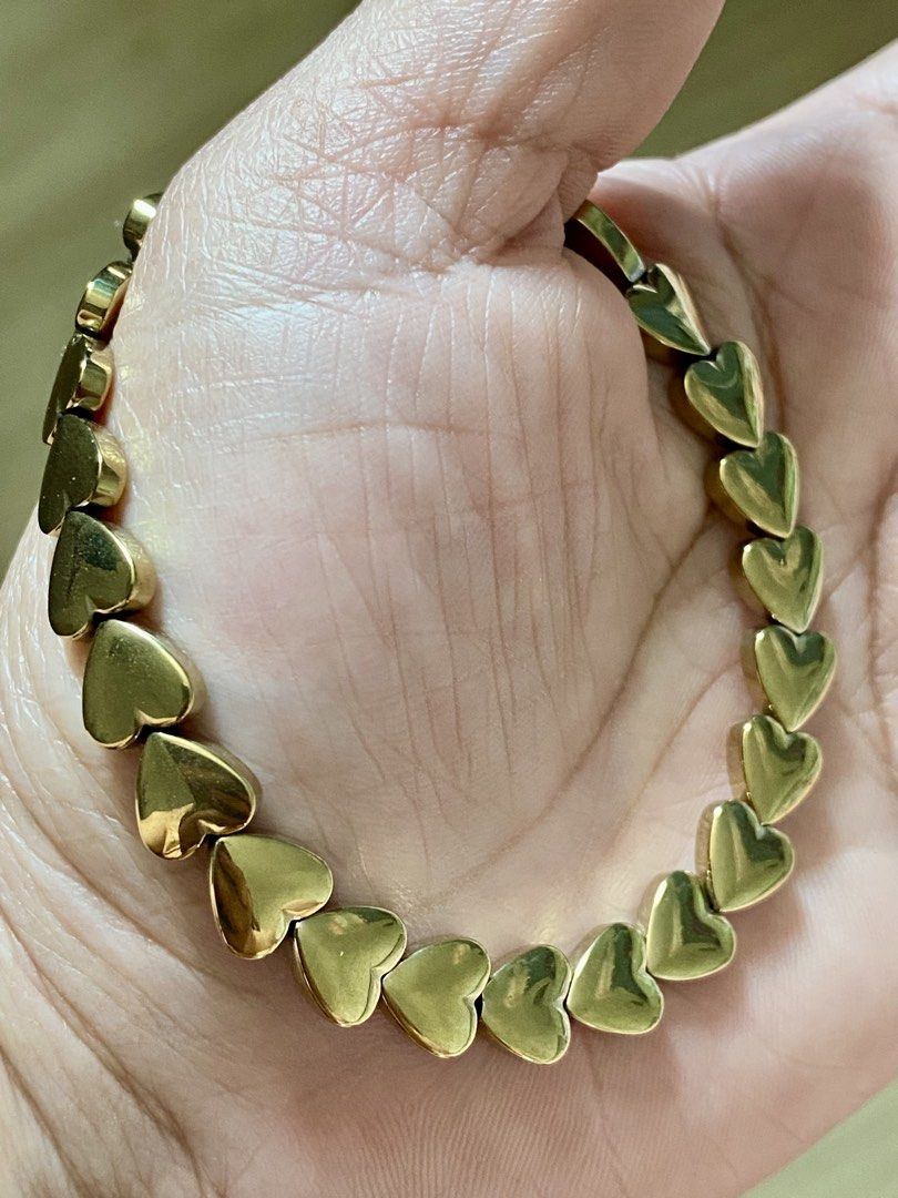 Golden Hematite Heart Bangle Bracelet (Category: Bracelets) located in Pasig City. Submitted by talaversify (Listing ID 1463168877, Image 2). Description: Semi-precious stone: Hematite Stone size: 8mm Wrist size: 16cm 💠 Natural stone 💠.