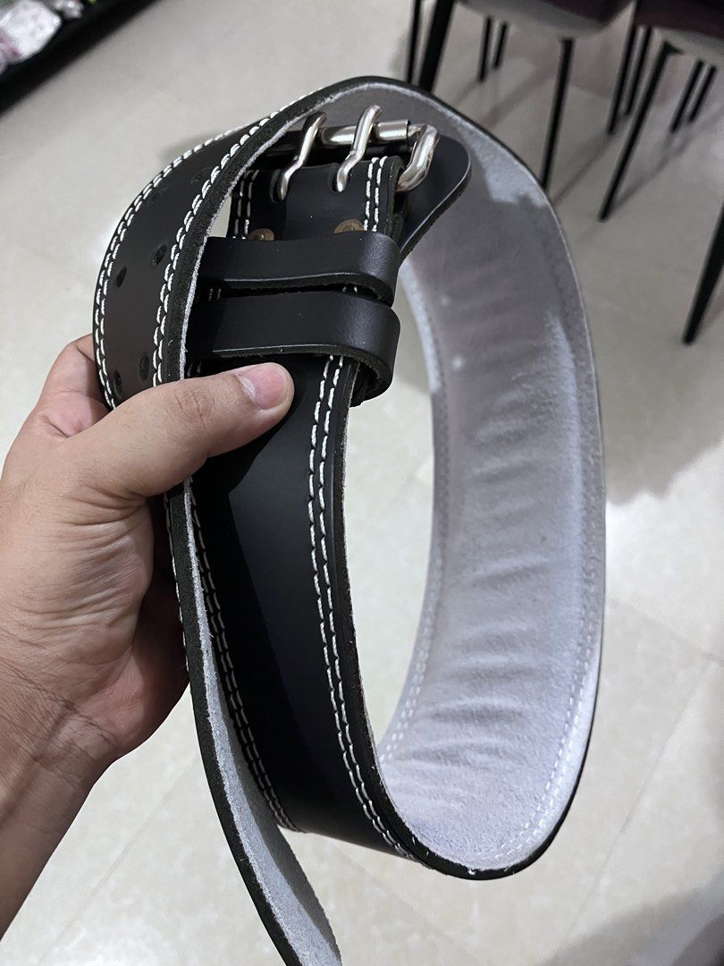 Gold's Gym Weightlifting Belt (Category: Weights & Dumbbells) located in Manila. Submitted by mariotimba66418 (Listing ID 1463221129, Image 2). Description: - Genuine Black Leather Weightlifting Belt from Gold's Gym - Stylish White Stitching - Secure and Sturdy Buckle Closure - Provides excellent back support for heavy lifting - Ideal for your intense gym sessions .