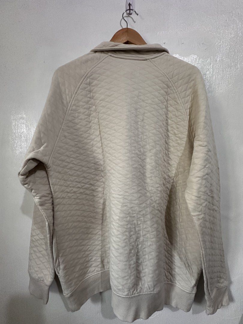 Goodfellow & Co Pullover Sweater (Category: Hoodies) located in Bulacan. Submitted by zerowastewardrobe (Listing ID 1463313644, Image 2). Description: This is a cream quilted pullover sweatshirt featuring a snap-button placket with contrasting brown trim. Size on tag L W23.5 x L29 **Please read*** For mailing & delivery only. No pick up No COD Courier is J&T Express or Lalamove (same day deliver). Shipping fee is shouldered by buyer. Return & ref