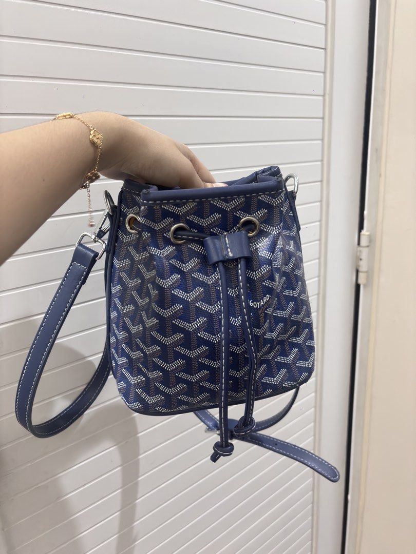 Goyard Blue Monogram Bucket Bag (Category: Luxury Bags & Wallets) located in Manila. Submitted by xoxo_tine (Listing ID 1463240068, Image 1). Description: - Authentic Blue Goyard Bucket Bag - Signature Goyardine Monogram Print - Durable Leather Trim - Secure Drawstring Closure - Adjustable Shoulder Strap for Comfort - Vibrant Yellow Interior Lining - Ideal for Everyday Use or Travel - Shows Minimal Signs of Wear.