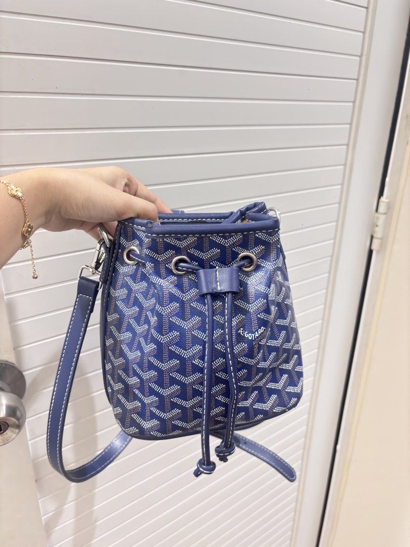 Goyard Blue Monogram Bucket Bag (Category: Luxury Bags & Wallets) located in Manila. Submitted by xoxo_tine (Listing ID 1463240068, Image 2). Description: - Authentic Blue Goyard Bucket Bag - Signature Goyardine Monogram Print - Durable Leather Trim - Secure Drawstring Closure - Adjustable Shoulder Strap for Comfort - Vibrant Yellow Interior Lining - Ideal for Everyday Use or Travel - Shows Minimal Signs of Wear.