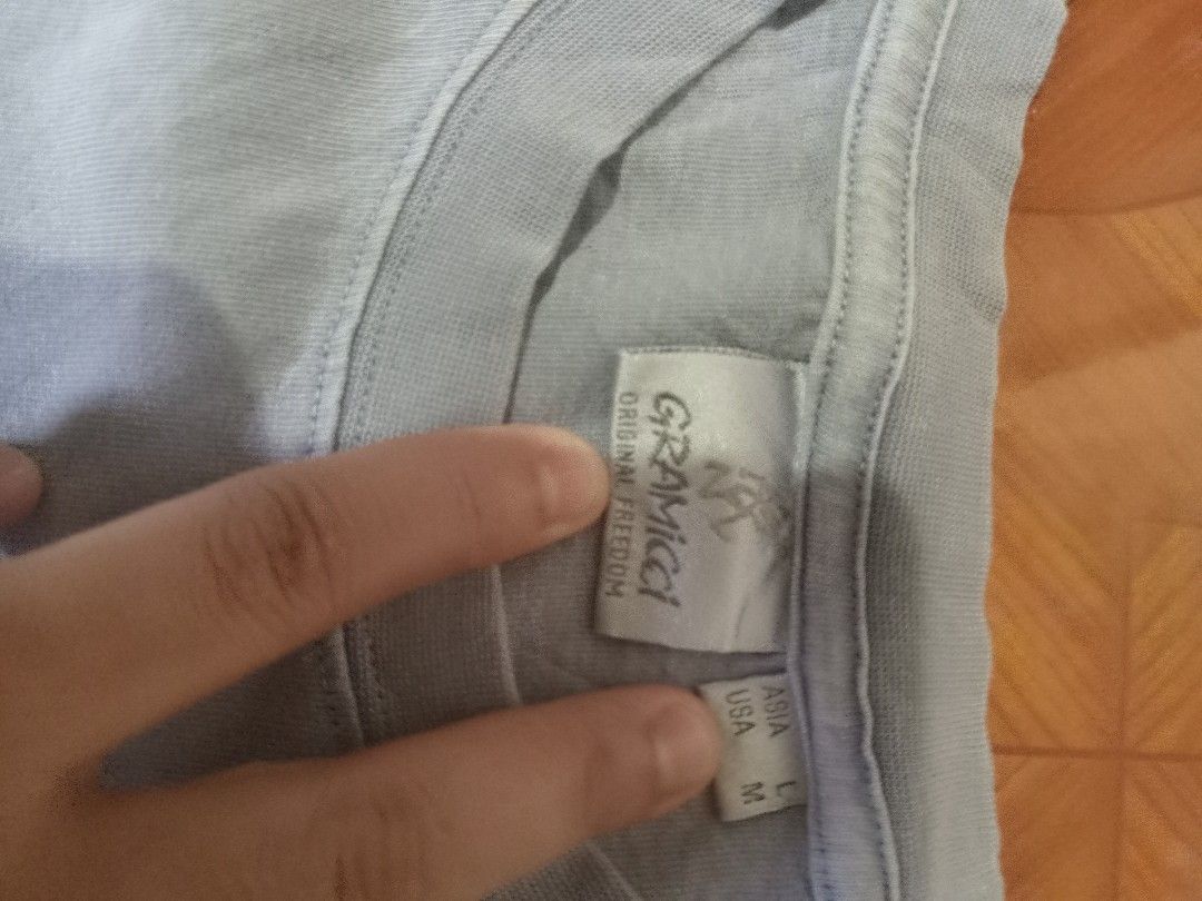 Gramicci Long Sleeve (Category: Tshirts & Polo Shirts ) located in Bacoor. Submitted by kristianl71969 (Listing ID 1463134486, Image 3). Description: - Gramicci Long Sleeve Tee - Color: Light blue/grey - Design: Graphic print on back, small logo on front chest - Material: 100% Cotton - Size: Medium (fits like Asia Large) - Ideal for: Casual wear -22x28 -verygood condi -no issue -need wash -850 freeship.