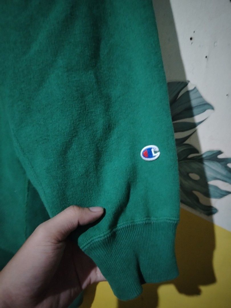 Green Champion Reverse Weave Sweatshirt (Category: Coats, Jackets and Outerwear) located in Caloocan City. Submitted by vincefresn21903 (Listing ID 1463258390, Image 2). Description: - Vintage green Champion sweatshirt - Iconic embroidered Champion logo on chest - Ribbed cuffs and hem for a snug fit - Ideal for comfortable and stylish everyday wear.