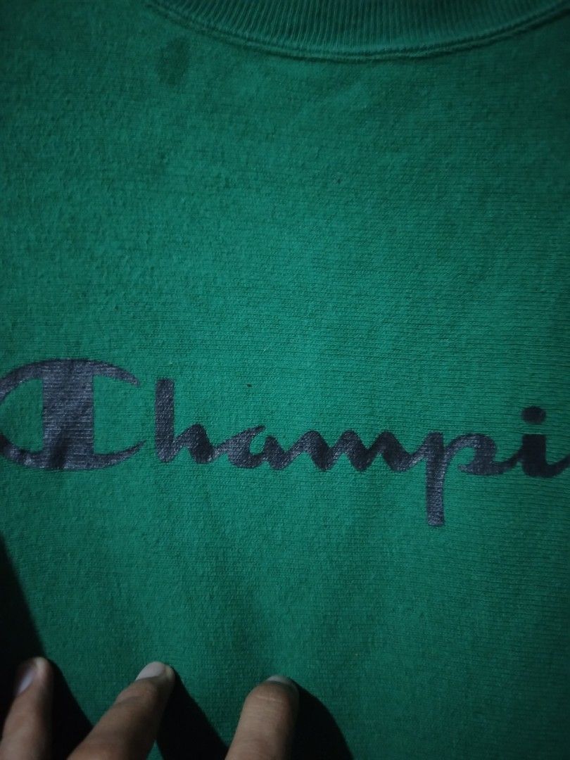 Green Champion Reverse Weave Sweatshirt (Category: Coats, Jackets and Outerwear) located in Caloocan City. Submitted by vincefresn21903 (Listing ID 1463258390, Image 3). Description: - Vintage green Champion sweatshirt - Iconic embroidered Champion logo on chest - Ribbed cuffs and hem for a snug fit - Ideal for comfortable and stylish everyday wear.
