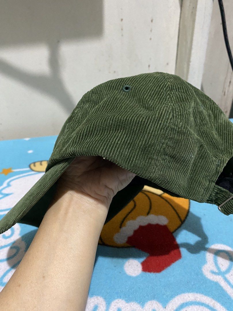 Green Corduroy Cap with Smoothmood Patch (Category: Caps & Hats) located in Manila. Submitted by resi.diaz (Listing ID 1463277554, Image 3). Description: - Trendy green corduroy baseball cap - Features a white patch with 'Smoothmood' text - Adjustable strap at the back for a custom fit - Ideal for everyday casual wear.
