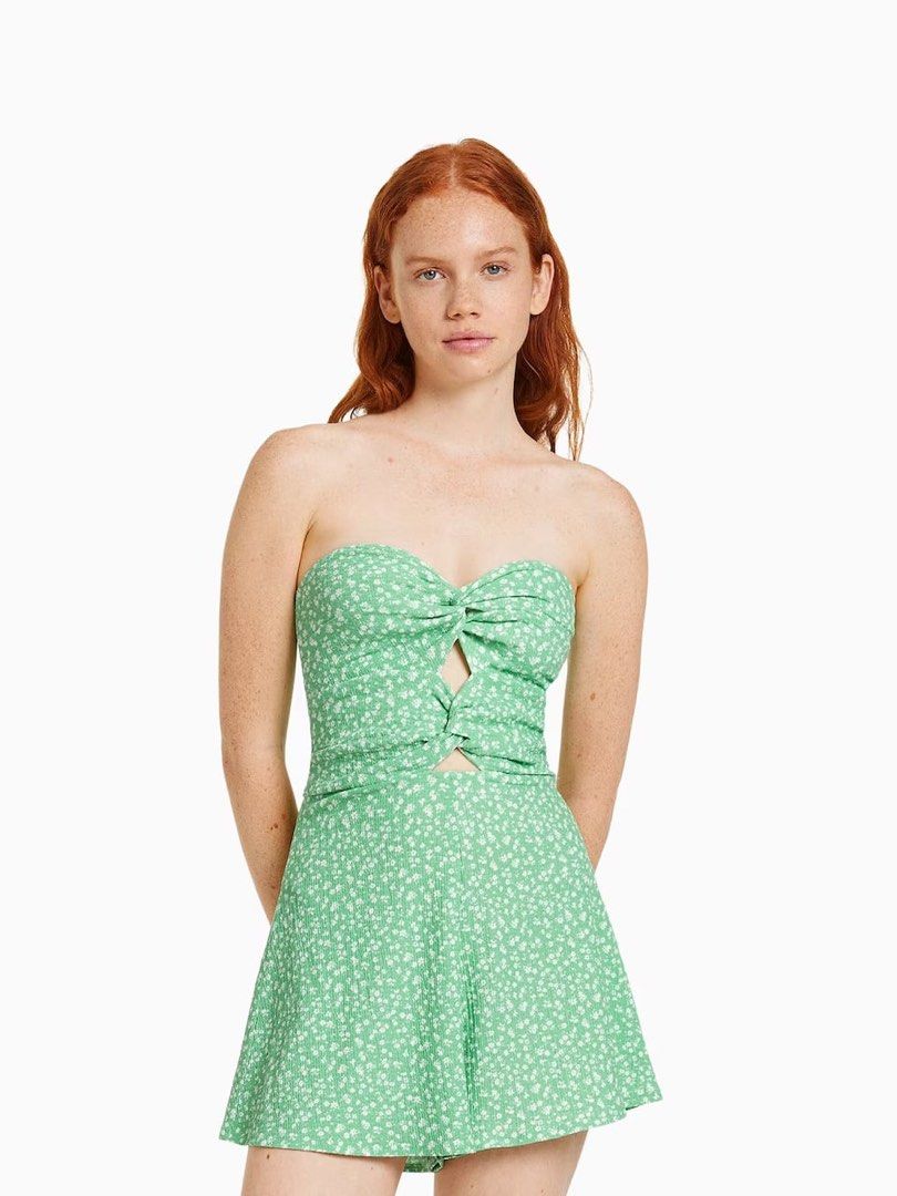 Green Floral Strapless Romper (Category: Dresses) located in Manila. Submitted by gentlecloud-91cd (Listing ID 1463165424, Image 1). Description: - Adorable green mini dress with a charming floral print. - Strapless design with a stylish twist-front detail. - Features a trendy cut-out at the waist. - Comfortable ribbed fabric texture. - Ideal for summer outings, beach days, or parties. - Effortlessly chic and easy to wear..