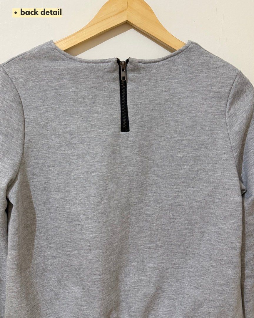 Grey Crewneck Sweatshirt with Back Zipper (Category: Longsleeves) located in Subic. Submitted by ciesells (Listing ID 1463150682, Image 2). Description: Bust: 40 Sleeve: 22in - Zipper detail at the back - No issues mop: bpi/maribank/maya.