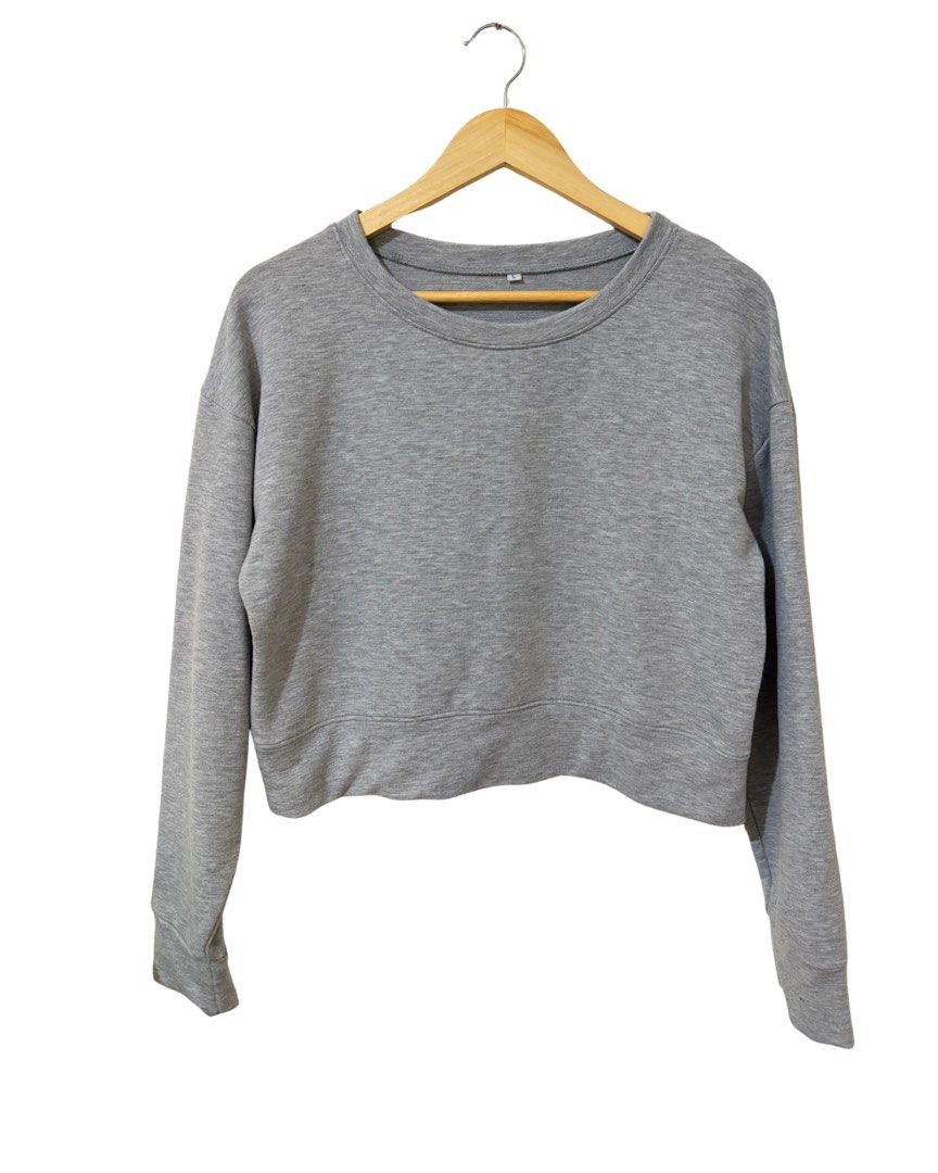 Grey Cropped Long Sleeve Sweatshirt (Category: Longsleeves) located in Subic. Submitted by ciesells (Listing ID 1463150036, Image 1). Description: Bust: 40 Sleeve: 22 inches Body length: 18 inches - Cropped sweatshirt - Classic crew neck mop: bpi/maribank/maya.
