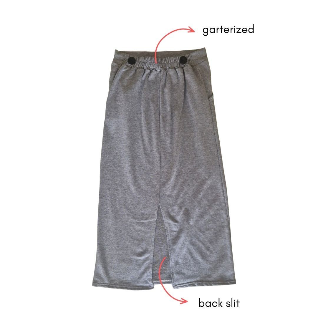 Grey long skirt (Category: Skirts) located in Quezon City. Submitted by purpleberry.98 (Listing ID 1463210357, Image 2). Description: -garterized -with middle slit.