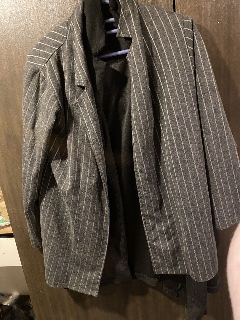 Grey Pinstripe Blazer and Pants Set (Category: Sets or Coordinates) located in Manila. Submitted by hanzlopez (Listing ID 1463272490, Image 1). Description: - Grey blazer and matching pants set - Features subtle white pinstripes on both pieces - Blazer has a classic single-button closure - Pants offer comfort with an elastic waistband - Ideal for professional settings or a smart casual outfit.
