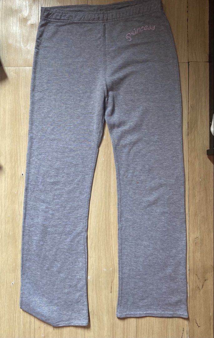 Grey Sweatpants with 'Princess' Embroidery (Category: Joggers) located in Tanauan. Submitted by rie098 (Listing ID 1463291073, Image 2). Description: - Grey sweatpants with 'Princess' embroidery in pink on the left hip. - Comfortable elastic waistband. - Stylish wide leg opening. - Ideal for lounging, casual outings, or everyday wear..