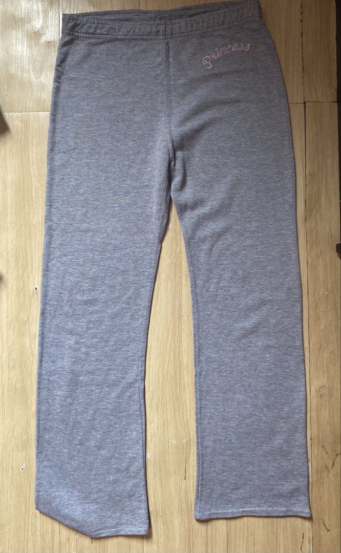 Grey Sweatpants with 'Princess' Embroidery (Category: Joggers) located in Tanauan. Submitted by rie098 (Listing ID 1463291073, Image 1). Description: - Grey sweatpants with 'Princess' embroidery in pink on the left hip. - Comfortable elastic waistband. - Stylish wide leg opening. - Ideal for lounging, casual outings, or everyday wear..