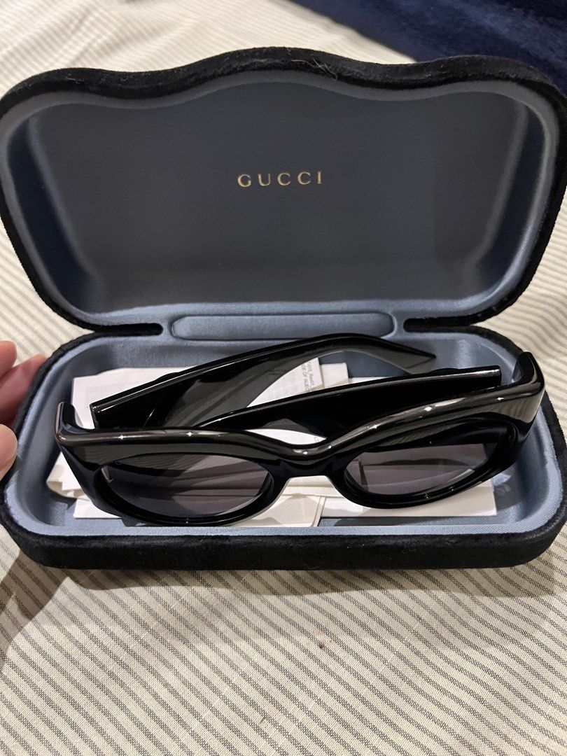 Gucci Black Cat Eye Sunglasses with Case (Category: Sunglasses & Eyewear) located in Marikina City. Submitted by patrickmontojo.ramos (Listing ID 1463276405, Image 1). Description: - Authentic Gucci sunglasses - Stylish black cat-eye frames - Iconic GG logo detail on the sides - Expertly crafted in Italy - Comes with original Gucci case - Ideal for sunny days and adding flair to your look.