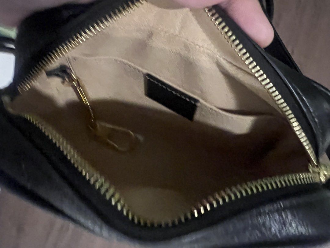 Gucci Black Leather Ophidia Camera Bag (Category: Luxury Bags & Wallets) located in Paranaque City. Submitted by katlopez0214 (Listing ID 1463238055, Image 3). Description: - Authentic Black Leather Gucci Camera Bag - Gold Hardware - Signature Green and Red Stripe - Secure Zip Closure - Interior Pocket - Convenient Keychain Clip - Adjustable Strap for Comfort - Ideal for Everyday Use.