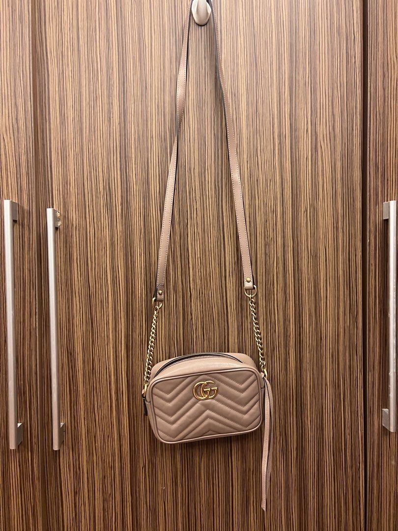 Gucci Marmont Camera Bag Beige Leather (Category: Luxury Bags & Wallets) located in Paranaque City. Submitted by katlopez0214 (Listing ID 1463233223, Image 2). Description: - Authentic Gucci Marmont camera bag - Color: Beige quilted leather - Hardware: Gold GG logo - Straps: Detachable chain strap and leather shoulder strap - Closure: Zipper - Condition: Excellent - with generic dustbag.