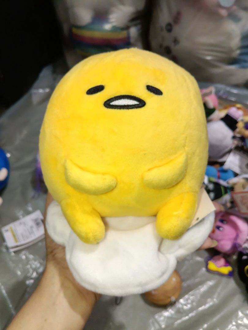 gudetama sitting on a white cushion (Category: Plushies & Soft Toys) located in San Marcelino. Submitted by cmplushies (Listing ID 1463192183, Image 1). Description: .