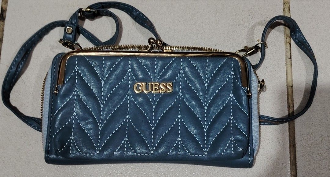 Guess Wallet, Longchamp Mini Bag, and More (Category: Luxury Bags & Wallets) located in Manila. Submitted by imissmistergray (Listing ID 1463179575, Image 3). Description: - Bundle includes 4 items: Guess blue quilted wallet, straw-like tote with horse design (Longchamp style), brown checkered wallet/pouch, and a dark blue pouch. - Ideal for organizing small essentials or as travel pouches. - Selling as a complete set. Note: Selling strictly as a