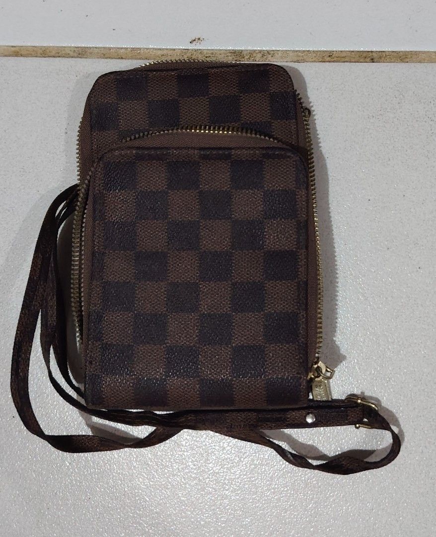 Guess Wallet, Longchamp Mini Bag, and More (Category: Luxury Bags & Wallets) located in Manila. Submitted by imissmistergray (Listing ID 1463179575, Image 2). Description: - Bundle includes 4 items: Guess blue quilted wallet, straw-like tote with horse design (Longchamp style), brown checkered wallet/pouch, and a dark blue pouch. - Ideal for organizing small essentials or as travel pouches. - Selling as a complete set. Note: Selling strictly as a