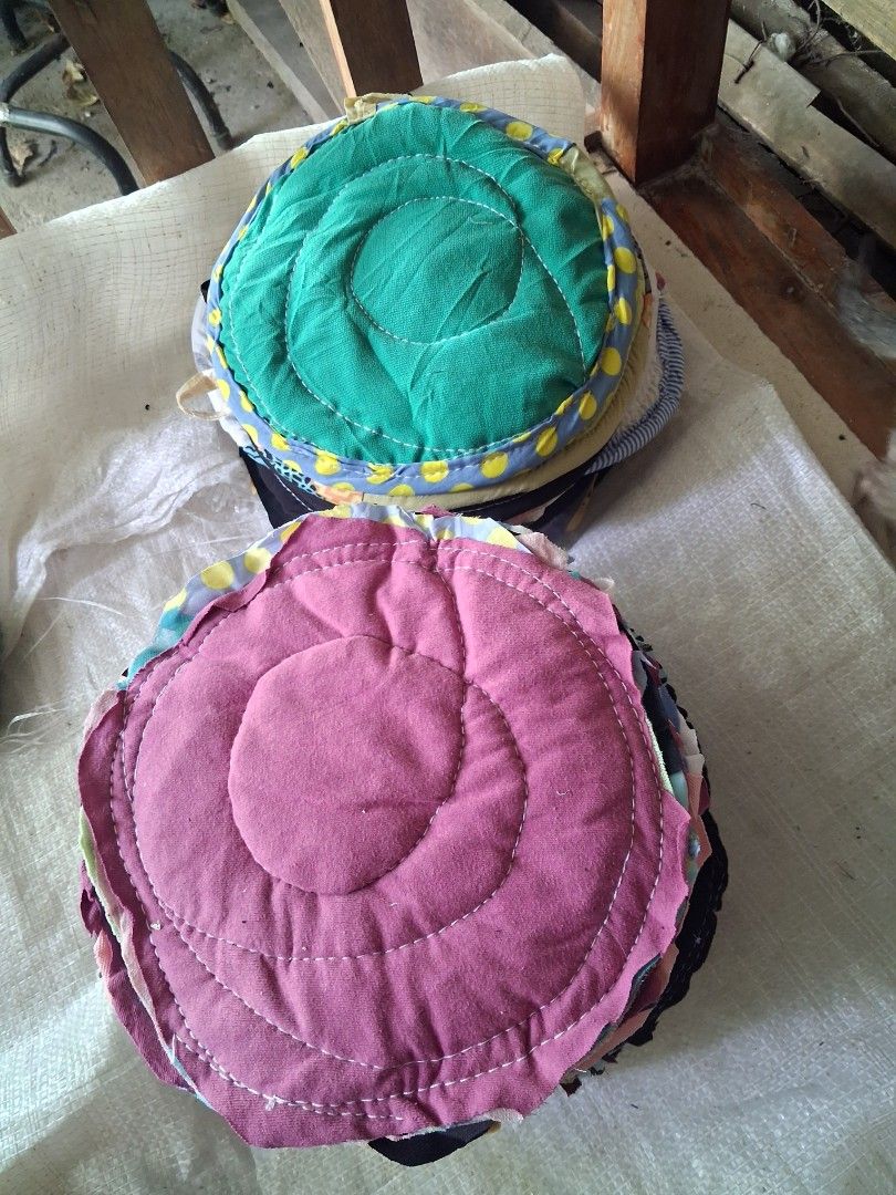 Handmade Quilted Pot Holders Set (Category: Cookware & Accessories) located in Cabanatuan. Submitted by ronnelpena (Listing ID 1463255614, Image 3). Description: - Set of 2 round quilted pot holders - Vibrant green with yellow polka dot trim - Soft pink with layered fabric edge - Concentric stitching for a classic look - Ideal for protecting hands while cooking.