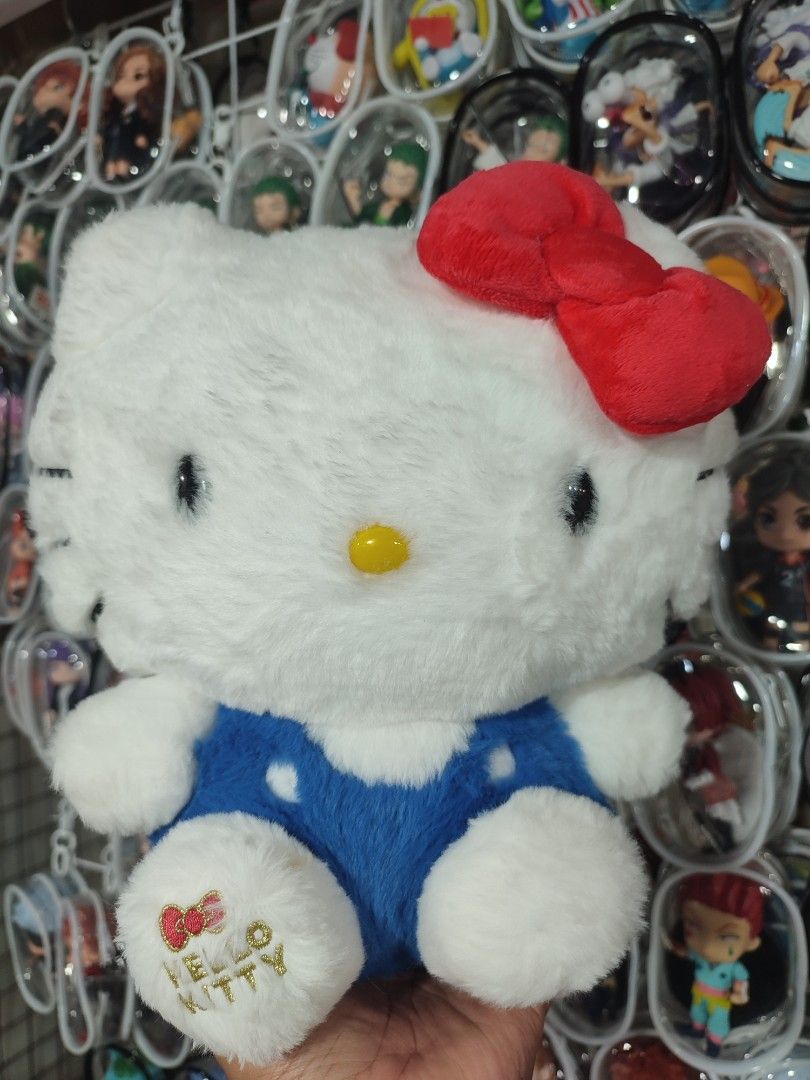 Hello Kitty 50th Anniversary Plush Toy (Category: Plushies & Soft Toys) located in Manila. Submitted by epicmountain-f20453 (Listing ID 1463225805, Image 1). Description: - Super cute Kitty plush toy - Special 50th Anniversary edition - Soft and fluffy white fur - Adorable blue overall outfit - Features embroidered Kitty logo on foot - Perfect collectible for fans - Officially licensed by Sanrio.