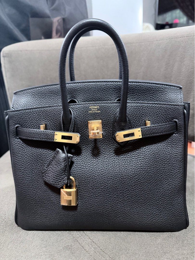 Hermes Birkin Black Grained Leather Gold Hardware (Category: Luxury Bags & Wallets) located in Subic. Submitted by cottoncandy2008 (Listing ID 1463176693, Image 1). Description: - Classic black Hermes Birkin bag - Grained leather with gold hardware - Includes lock and keys - Felt protector included - Versatile for everyday or special occasions - A timeless investment piece.
