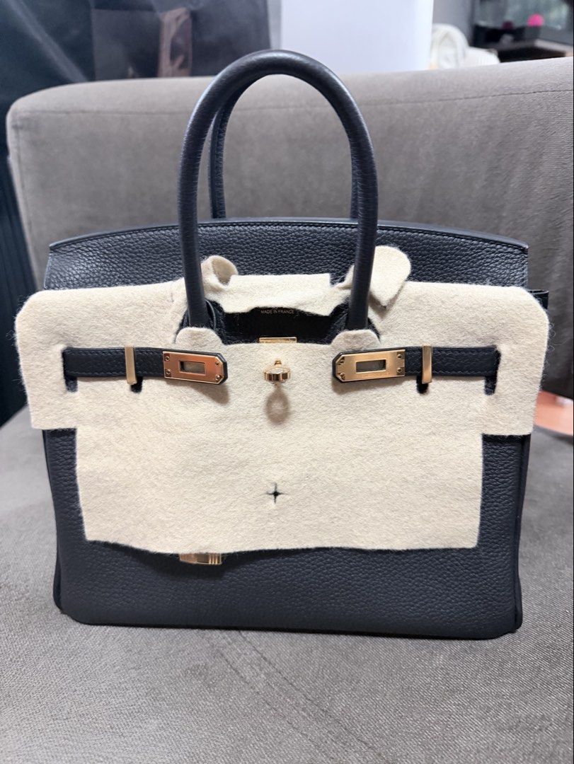 Hermes Birkin Black Grained Leather Gold Hardware (Category: Luxury Bags & Wallets) located in Subic. Submitted by cottoncandy2008 (Listing ID 1463176693, Image 2). Description: - Classic black Hermes Birkin bag - Grained leather with gold hardware - Includes lock and keys - Felt protector included - Versatile for everyday or special occasions - A timeless investment piece.