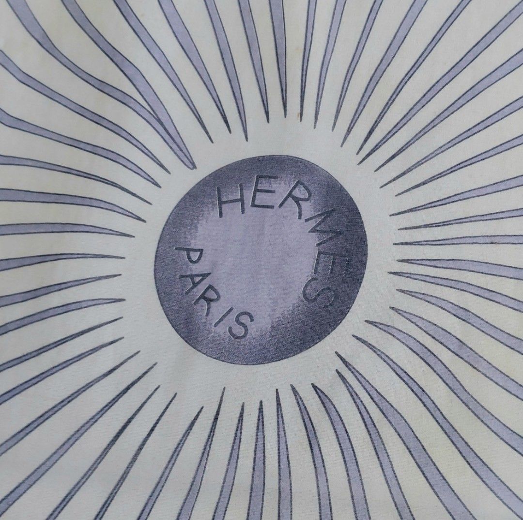 Hermes Paris Silk Scarf (Category: Scarves) located in Lapu Lapu. Submitted by agnesapm_29813 (Listing ID 1463230284, Image 3). Description: - Features a sunburst pattern with Hermes Paris logo at the center - Measurements: 49 inches x 47 inches - Versatile accessory to elevate any outfit - Hand rolled edges - No tag, no signature .