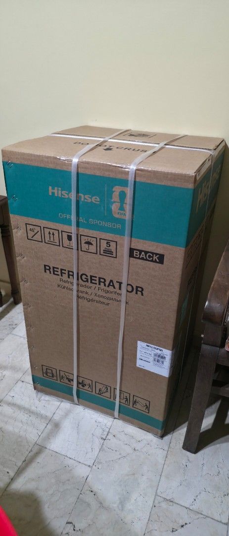 Single Door Refrigerator with free side table (Category: Refrigerators and Freezers) located in Taguig. Submitted by krisvill (Listing ID 1463298112, Image 1). Description: - Brand new Hisense Single Door Refrigerator - Model: RR121D2PSN - Capacity: 3.3 cu.ft. - Ideal for small spaces - Features a Fresh Zone compartment - Still in original, unopened packaging.