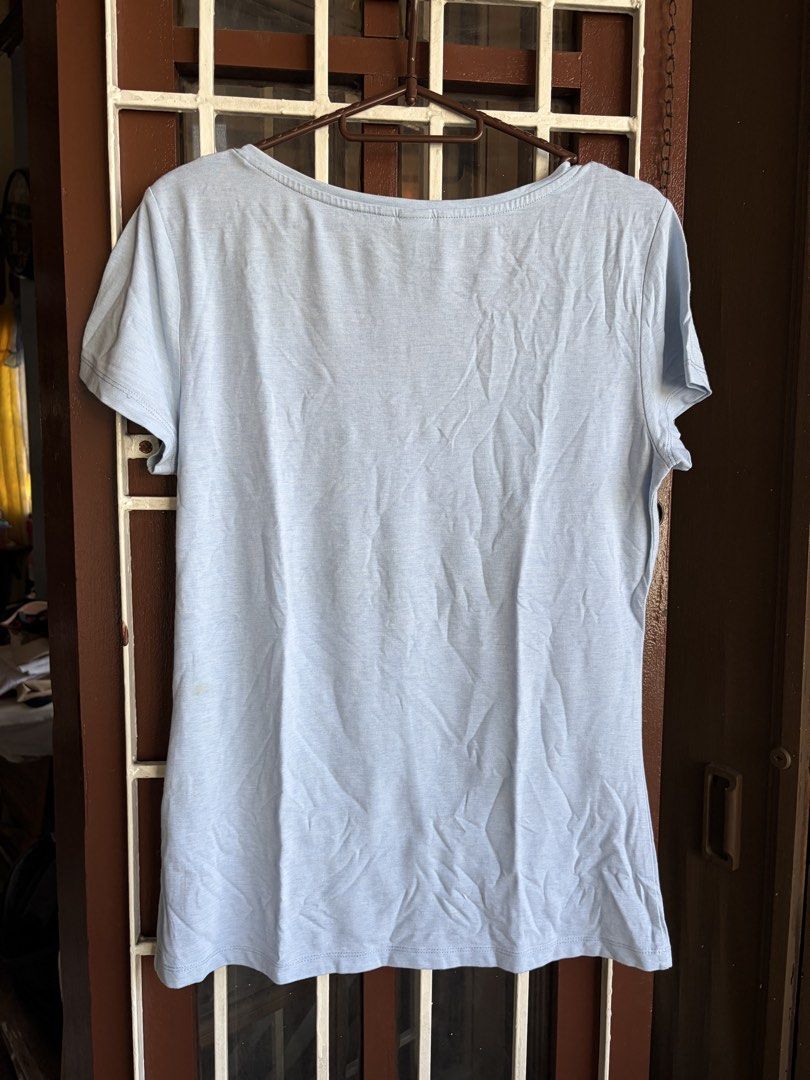 H&M Basic Light Blue V-Neck T-Shirt Size M (Category: Shirts) located in Las Pinas. Submitted by celly_belly (Listing ID 1463178413, Image 3). Description: - Light blue H&M basic tee - V-neck style with short sleeves - Comfortable for everyday wear - Size M (check photos for exact sizing) - Ideal for casual outfits.