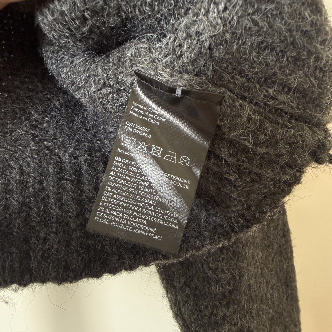 H&M Dark Grey Cropped Softknit Sweater (Category: Longsleeves) located in Baguio. Submitted by jnks_preloved (Listing ID 1463164788, Image 3). Description: - Dark grey cropped - semi-cropped knit sweater - Textured, fuzzy knit - Material: Blend of shell, alpaca, wool, and elastane - M on tag (S to M) - As New Fk if unsold: rfs: i have ganto na in other color and needs cash.