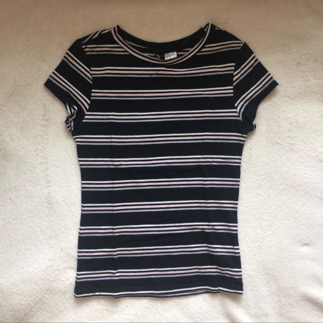 H&M Divided Multicolored Striped Top (Category: Shirts) located in Quezon City. Submitted by gg.finds (Listing ID 1463152604, Image 1). Description: - worn a few times, no flaws - lightweight and comfy material - flattering fit, form fitting (similar to baby tee) - size is XS - color is Black with multicolored stripes - rfs: decluttering, not my style anymore.