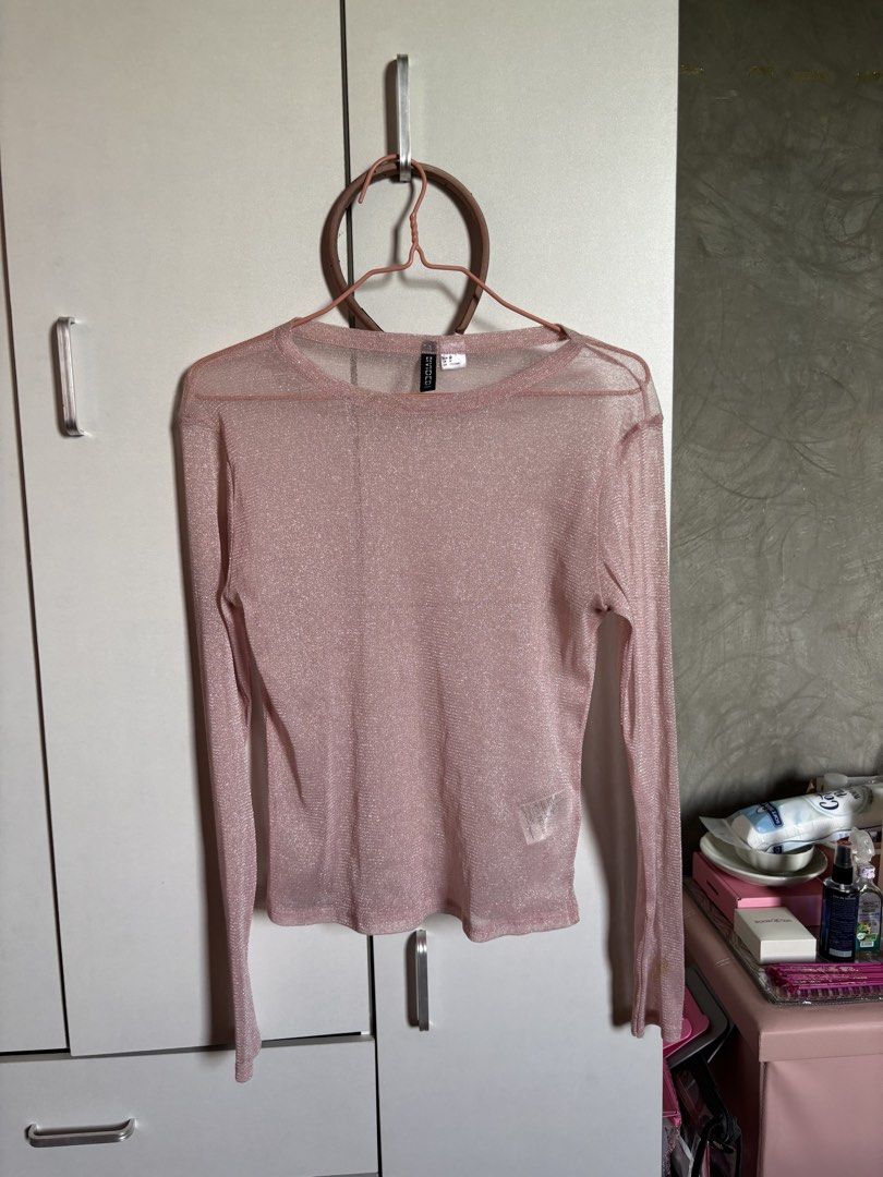 H&M Divided Pink Glittery Long Sleeve Top (Category: Longsleeves) located in Baguio. Submitted by pinkynj (Listing ID 1463188029, Image 1). Description: - Pink glittery long sleeve top from H&M Divided - Sheer material with a subtle sparkle - Perfect for layering or wearing solo - Size: EUR 36 / US 6 / UK 8 - Note: Small stain on sleeve (refer to last photo for details).