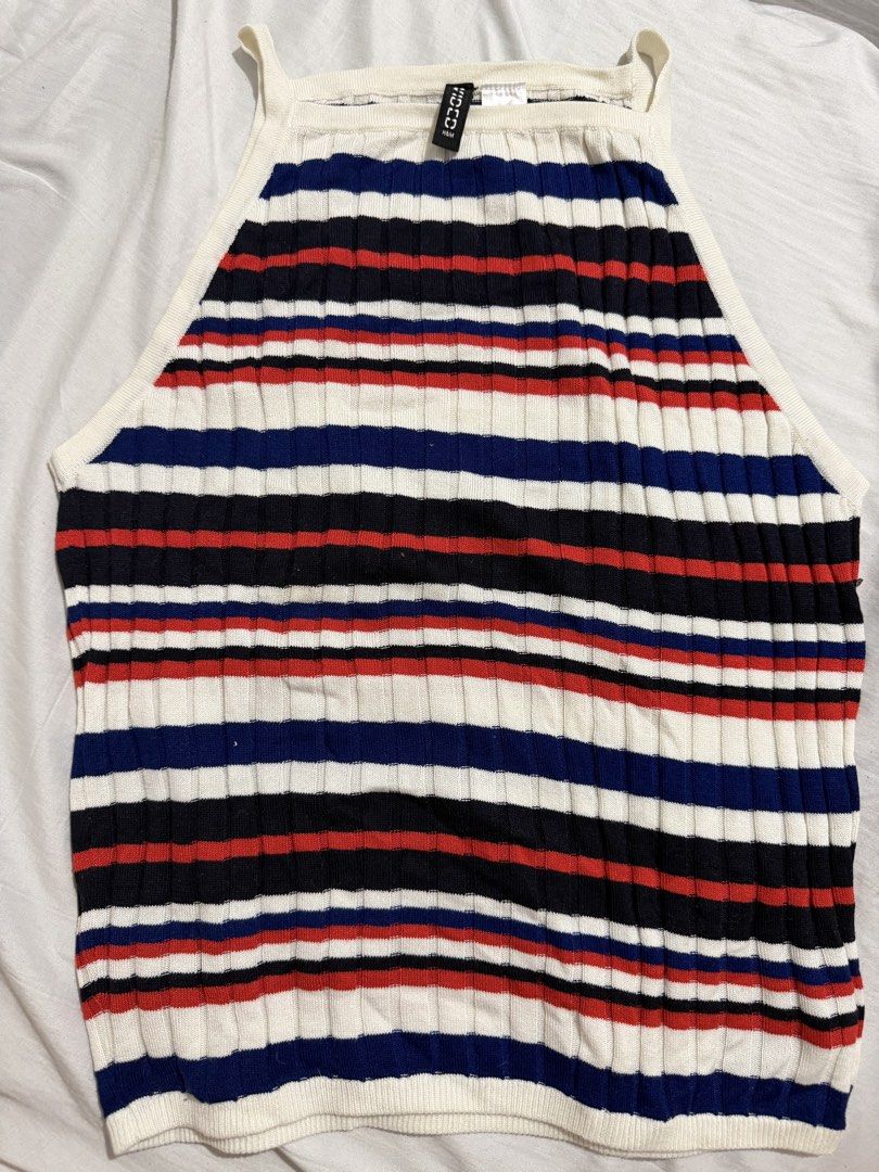 H&M Divided Striped Ribbed Halter Crop Top (Category: Sleeveless) located in Manila. Submitted by bexxyah (Listing ID 1463263382, Image 1). Description: - H&M Divided halter crop top - Ribbed knit fabric - Classic red, white, blue, and black stripe pattern - Adjustable straps - Versatile for casual wear or layering - Pairs well with jeans or shorts.