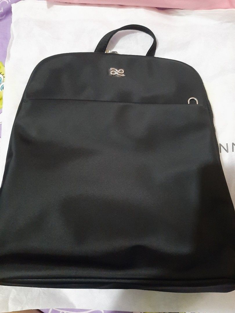 Holb Black Nylon Backpack with Small purse (Category: Tote Bags) located in Angono. Submitted by missyguelong (Listing ID 1463326442, Image 3). Description: - Brand New with tag - Original from Bangkok House of Little Bunny - Detachable shoulder strap - With small purse for keys or coins - Interior pockets - 2 zipper Main closure - 13" dimension per tag - For travel, office, casual.