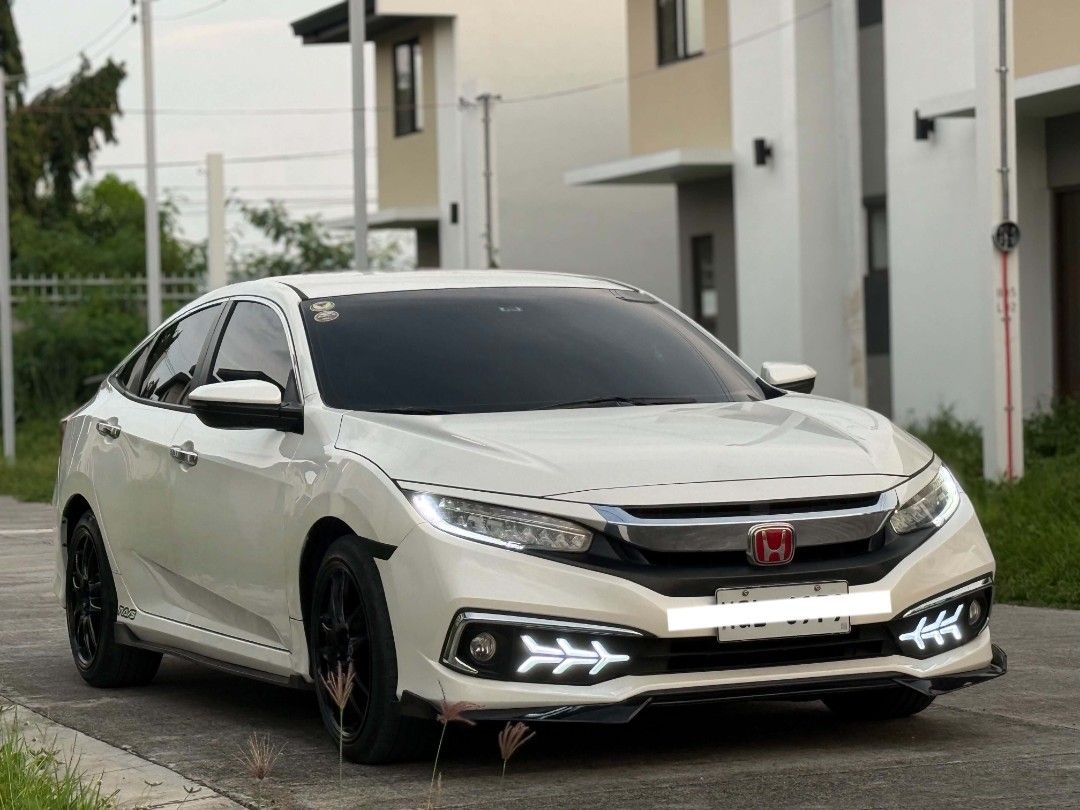 Honda Civic 1.8E 2021 Automatic Auto (Category: Used Cars) located in Santa Rosa. Submitted by mhann001992 (Listing ID 1463241898, Image 2). Description: For Sale Or Swap✔️ Financing ✔️ Honda Civic Fc 1.8E 2021 Automatic Transmission- - 2 Original Keys🔑 - Gasoline - Color Pearl White - Registered Till Sept, 2027 - Maintained - Smooth Shifting - Smell New - Touchscreen w/ Reverse Camera - Steering Wheel Controls - Thic Tire 97% - Fresh Inside and