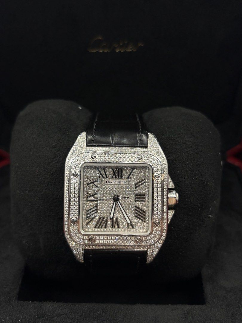 Iced Cartier Santos 100 (Category: Men's Watches) located in Pasig City. Submitted by nicoestradaa (Listing ID 1463194956, Image 1). Description: Cartier Santos 100 Brand new HK Natural diamonds AM Case With Gem certificate, Cartier card, box and authentication papers from Panotes Watches 290k.