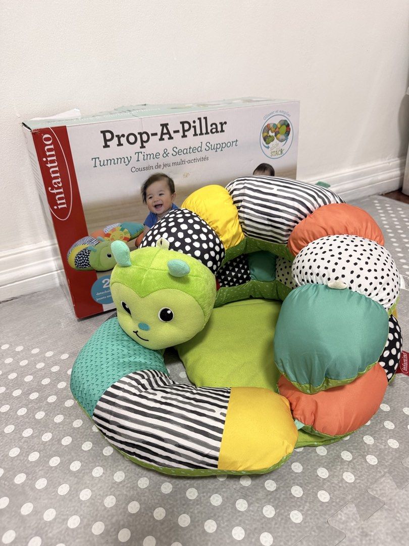 Infantino Prop-A-Pillar (Category: Infant Playtime) located in Quezon City. Submitted by ellabelles (Listing ID 1463163115, Image 1). Description: - Infantino Prop-A-Pillar for tummy time and seated support. - Multi-activity cushion with an engaging caterpillar design. - Helps with baby's development and play. - Comes with the original box..