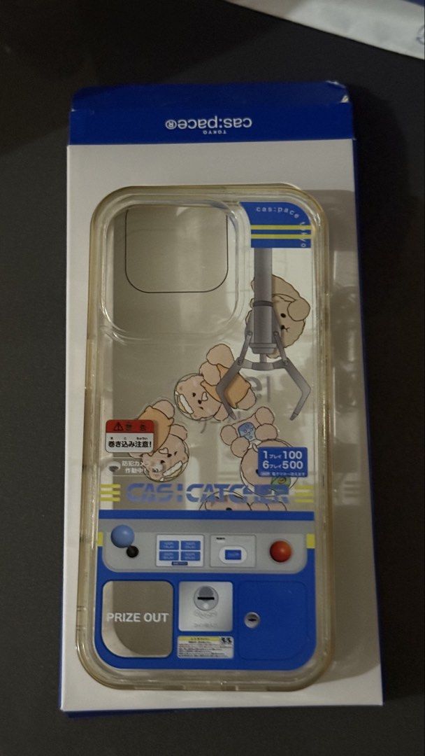 ip16 pro phone case (Category: Cases & Sleeves) located in Manila. Submitted by gabbi10 (Listing ID 1463276419, Image 1). Description: - Original phone case designed for iPhone 16 Pro. - Brand name: cas:pace - Og price: 1500 - Features a clear design with a claw machine and teddy bear graphic. - Yellowish and minor visible lines. - Still in good, usable condition. - RFS: school allowance .