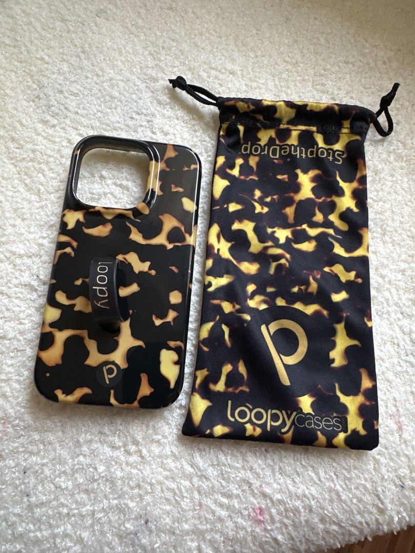 iPhone 14 Pro Loopy Tortoise Case (Category: Cases & Sleeves) located in Manila. Submitted by babimnlnewacc (Listing ID 1463150841, Image 1). Description: Used a few times only! ✨ Still in excellent condition, comes with pouch. ❌ No Return, Exchange, Refund. If unsure pls do not buy! Let us not waste each others time 🫶🏻.