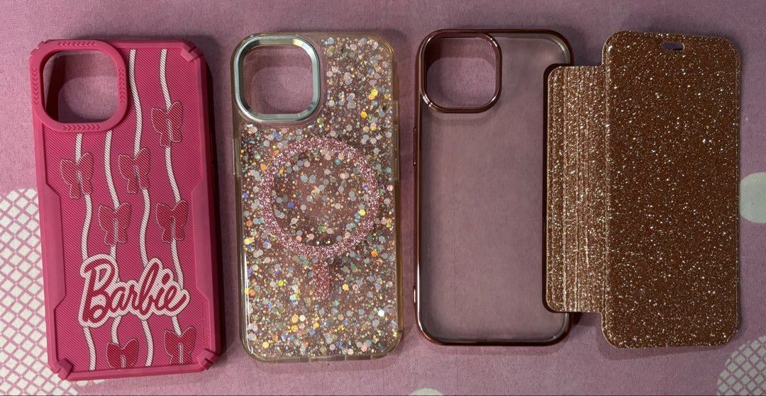iPhone 15 Cases (Category: Cases & Sleeves) located in Consolacion. Submitted by blancasbusiness (Listing ID 1457965310, Image 1). Description: iPhone 15 (Pink Barbie Case, Pink Glitter Acrylic Hard Case & Pink Glitter Flip Wallet Case). Used 3 times Has discoloration due to usage PM for further inquiries.