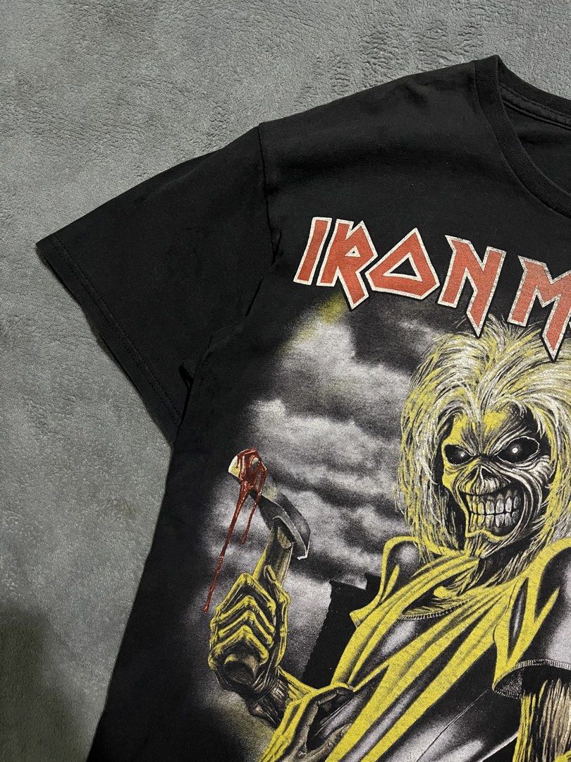 IRON MAIDEN (Category: Tshirts & Polo Shirts ) located in Manila. Submitted by ichann.lrdzbl (Listing ID 1463146448, Image 2). Description: 🏷️PRICE: 400 (Mine basis) 📐DIMENSION Width: 19.5 Length: 27 Size on tag: S-M 👖DETAILS Issue: Need Wash, Sun fade, Hairlines, Graphic fading (good fade) Condition Rate: 9/10 Color Rate: 9/10.