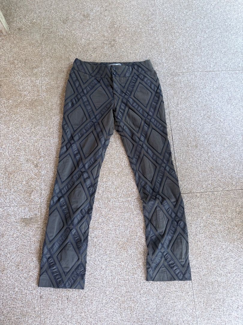 ISSEY MIYAKE Diamond Pattern Pants (Category: Jeans) located in Bislig. Submitted by zeazanayos15674 (Listing ID 1463178135, Image 1). Description: - Authentic Issey Miyake pants - Made in Japan - Unique diamond pattern - Color: Dark grey/khaki - Ideal for a statement or avant-garde style.