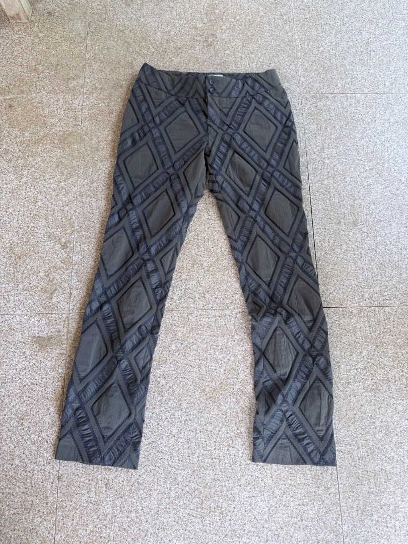 ISSEY MIYAKE Diamond Pattern Pants (Category: Jeans) located in Bislig. Submitted by zeazanayos15674 (Listing ID 1463178135, Image 2). Description: - Authentic Issey Miyake pants - Made in Japan - Unique diamond pattern - Color: Dark grey/khaki - Ideal for a statement or avant-garde style.