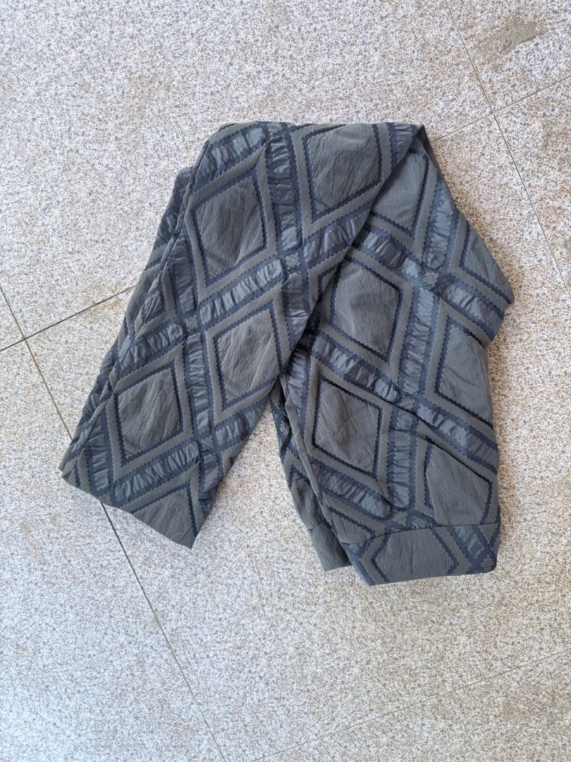 ISSEY MIYAKE Diamond Pattern Pants (Category: Jeans) located in Bislig. Submitted by zeazanayos15674 (Listing ID 1463178135, Image 3). Description: - Authentic Issey Miyake pants - Made in Japan - Unique diamond pattern - Color: Dark grey/khaki - Ideal for a statement or avant-garde style.