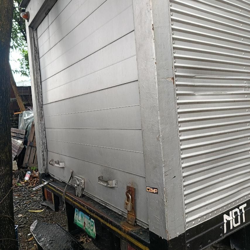 Isuzu Elf Aluminum Van Manual (Category: Used Cars) located in Caloocan City. Submitted by purchasingexxelprime001 (Listing ID 1463172472, Image 3). Description: Selling a reliable, weatherproof aluminum van body perfect for logistics, moving, or business deliveries..